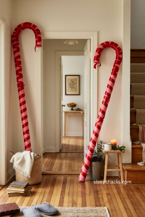 Six foot candy cane standees for a diy christmas entrance 