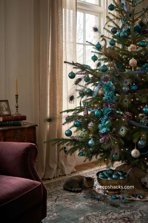 Personal peacock Christmas tree with collected feathers vintage ornaments and jewel toned decor 