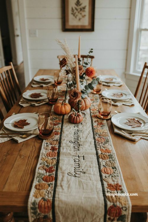 Personalized family name quilted Thanksgiving table runner with pumpkins and maple leaves
