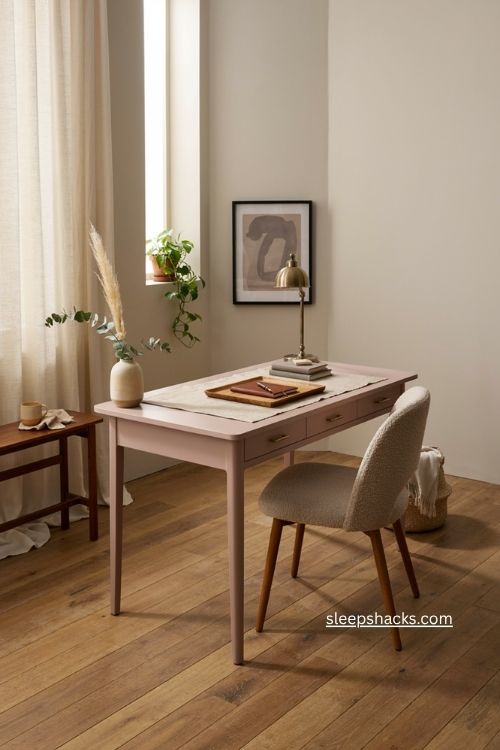 Pink office decor with matte dusty pink desk as a statement centerpiece 