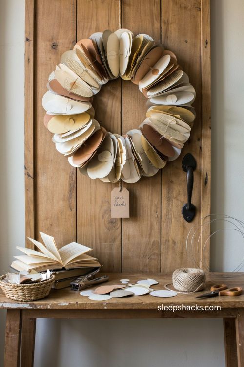 Punched paper circle wreath Thanksgiving decor with vintage book pages and layered paper 