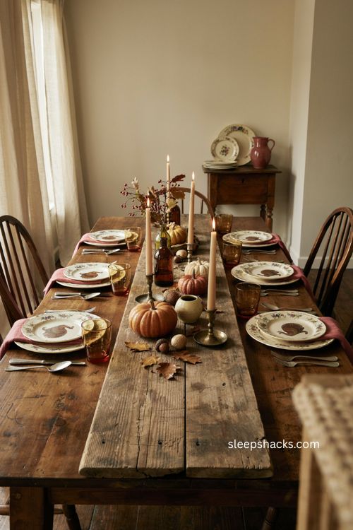 Reclaimed wooden riser vintage thanksgiving tablescape with rustic autumn centerpiece