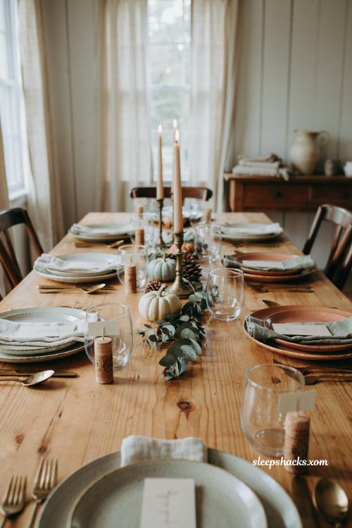 Rustic Thanksgiving tablescape with wine cork place card holders and linen napkins