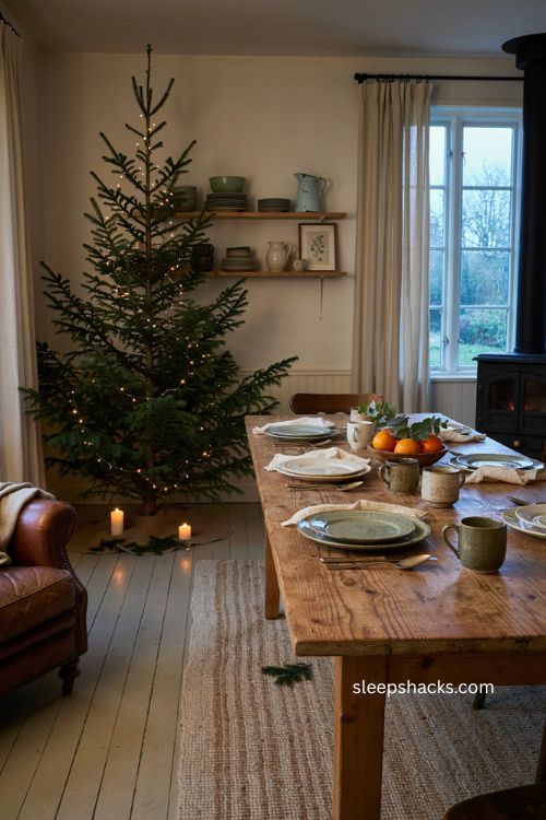 Simple Christmas tree decor for a cozy dining room with warm lights 