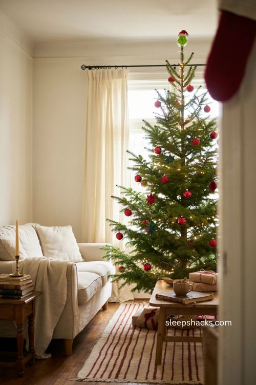 Simple kid friendly Grinch Christmas tree with red ornaments 