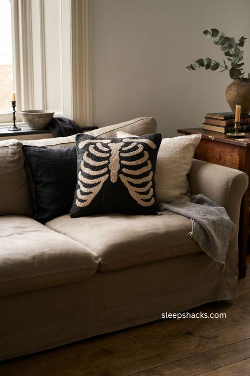 Skeleton hooked pillow for moody gothic Halloween sofa decor