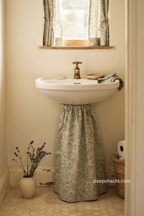 Skirted sink half bathroom ideas with hidden storage