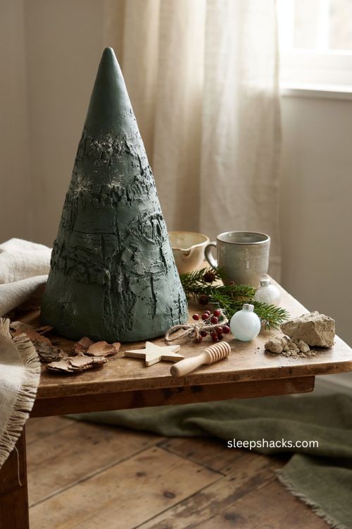 Textured bark effect clay christmas tree with deep green glaze and frosted finish