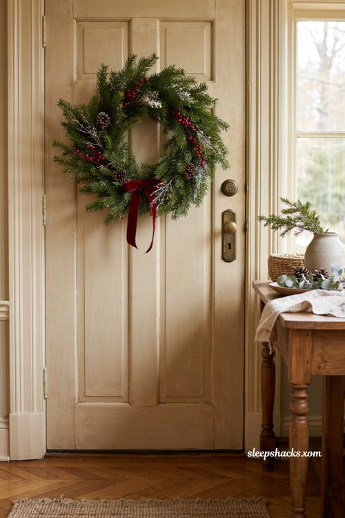 Thanksgiving Christmas decor wreath with evergreen berries and winter accents