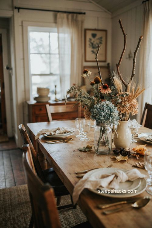 Thanksgiving centerpiece ideas with foraged fall bouquet in an old Mason jar