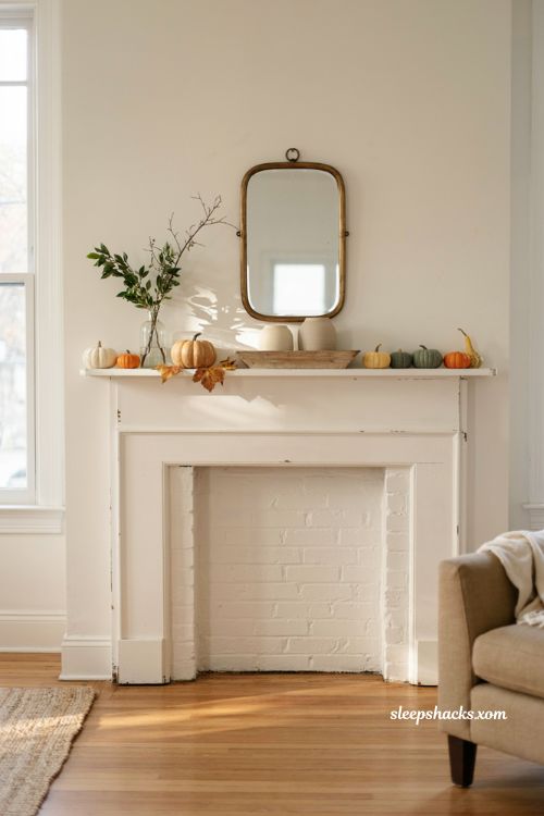 Thanksgiving mantle ideas with small pumpkins and greenery