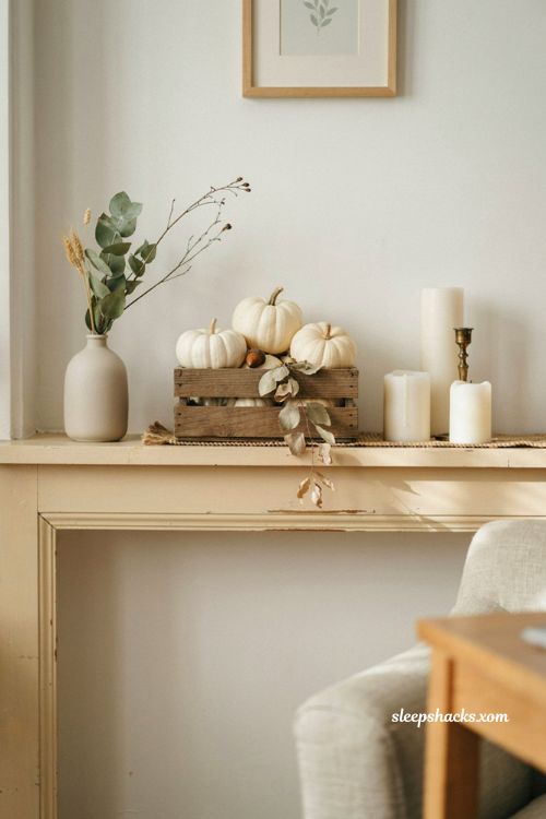 Thanksgiving mantle ideas with white pumpkins and candles