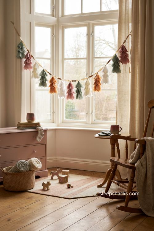 Tissue paper Christmas tree garland decor for a whimsical playroom