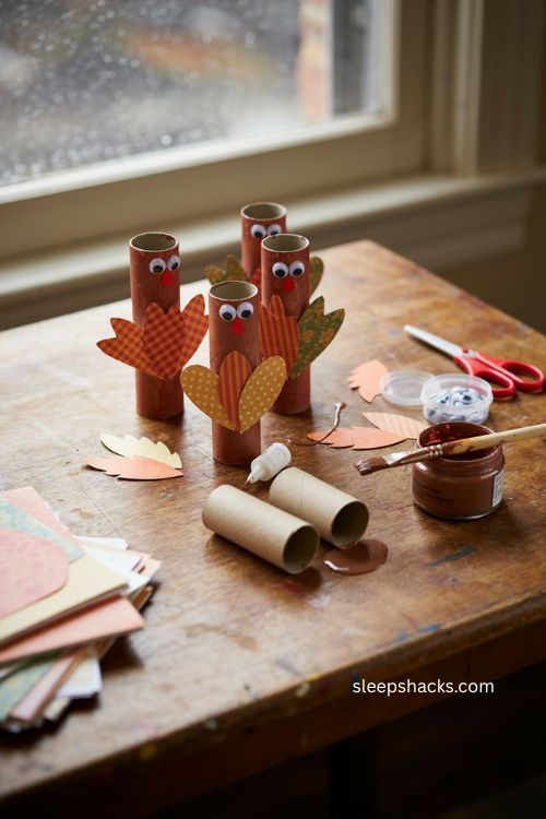Toilet paper roll turkey craft for toddlers with scrapbook paper feathers 