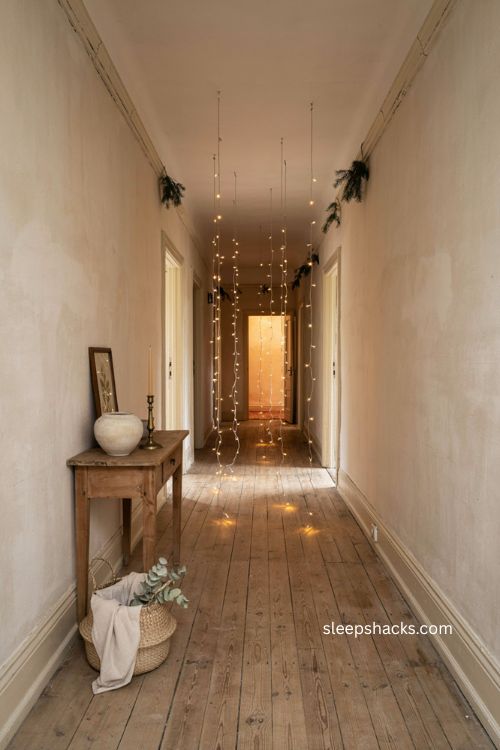 Vertical Christmas lights hanging from hallway ceiling 