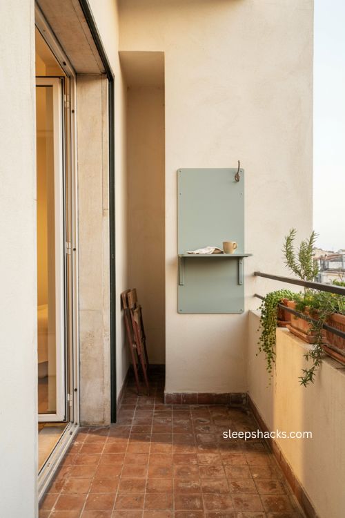 Very small balcony decor with fold down wall mounted table