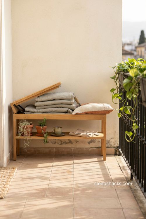 Very small balcony decor with multifunctional storage bench and seating