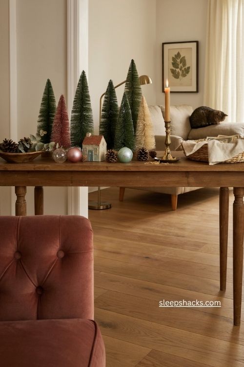 Vintage bottle brush christmas trees grouped in a nostalgic tabletop vignette 