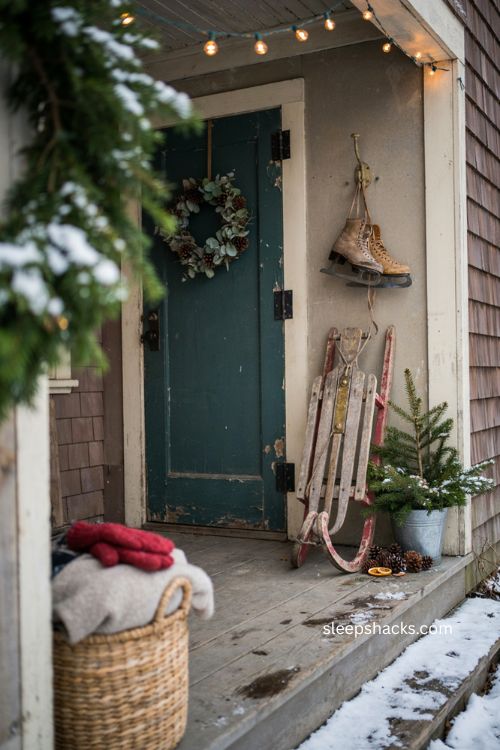 Vintage sled and ice skate Christmas porch decor ideas