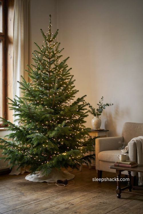 Warm white Christmas tree lights woven through branches for a cozy glowing holiday tree 
