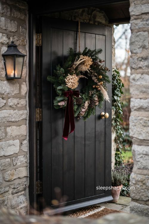 Whimsigoth christmas wreath with burgundy velvet bow antique gold and dark evergreen