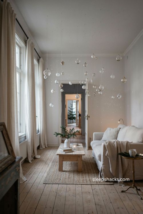Winter white Christmas ornaments hanging like falling snow 