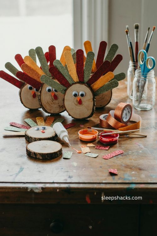 Wood slice turkey craft for toddlers with glittery washi tape feathers 