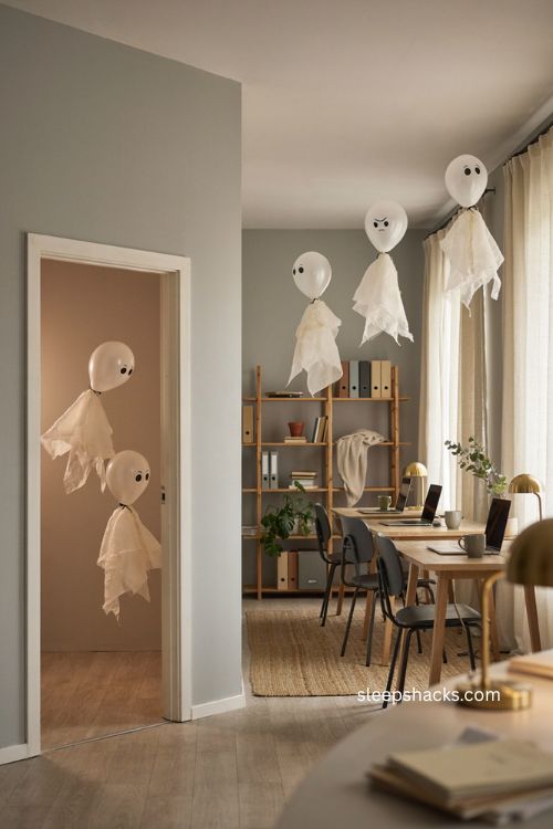 halloween office decor with handmade cheesecloth balloon ghosts 