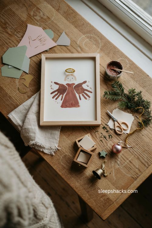 handprint angel christmas craft for toddlers with painted wings golden halo and framed keepsake 