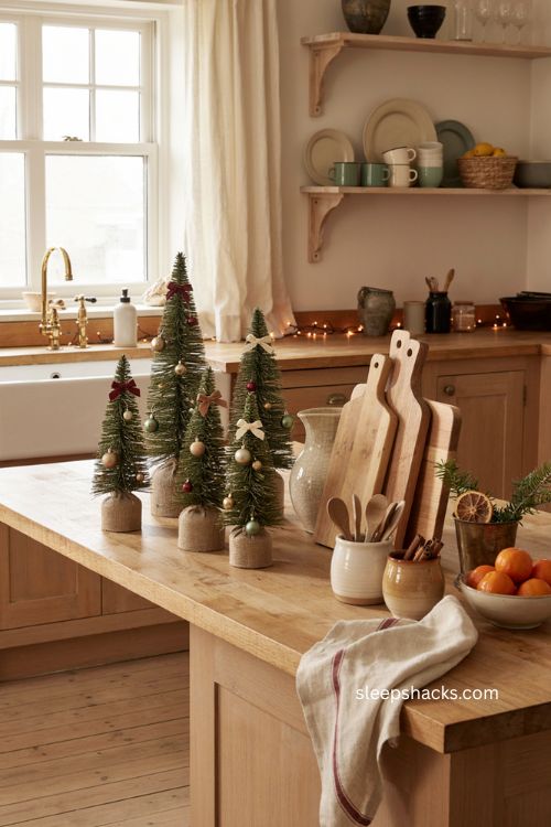 mini christmas trees on a cozy kitchen countertop 