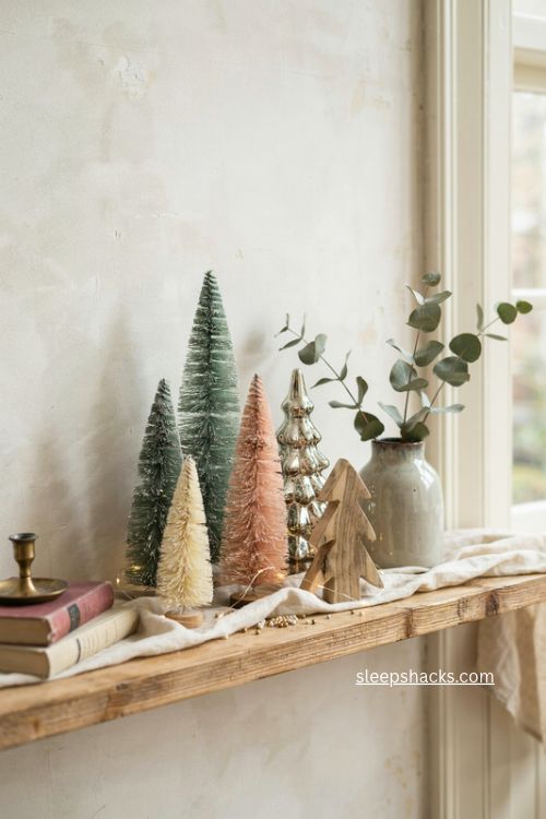 mix and match christmas tree trio console table decor with bottlebrush mercury glass and wood trees 
