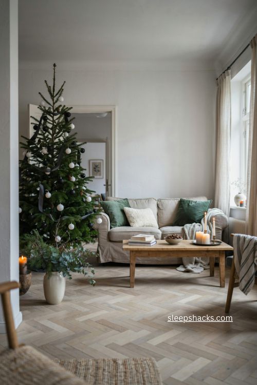 modern black white and green christmas decor with elegant green tree
