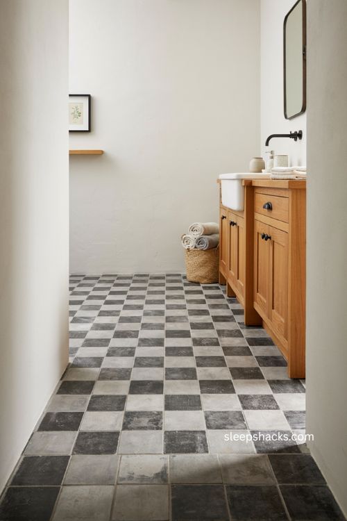modern farmhouse bathroom with bold black and white checkerboard floor tile 