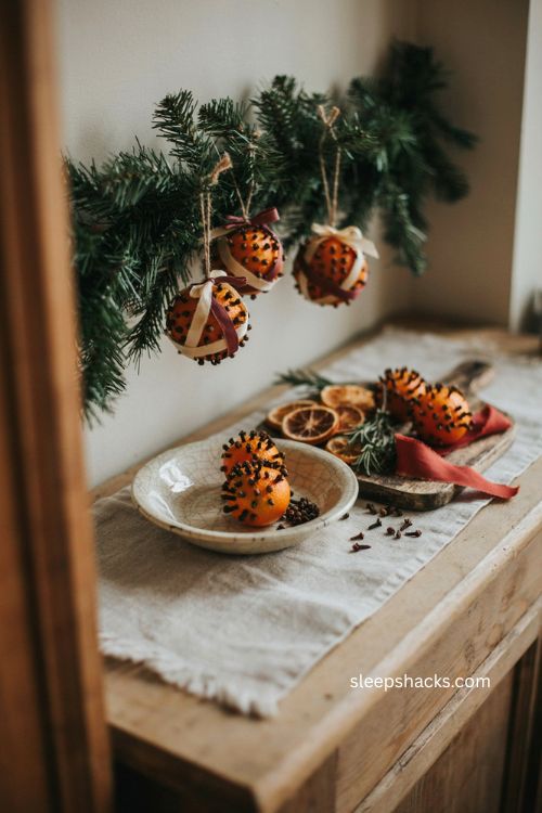 orange and clove pomander ornaments traditional christmas decor diy citrus decoration 