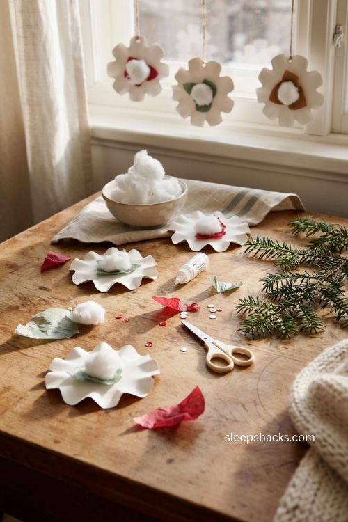 paper plate snowflake christmas craft for toddlers with cotton balls and tissue paper 