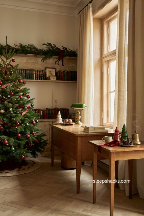 red and green office christmas decor with coordinated garland ornaments and ribbon 