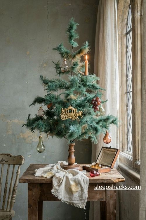 Antique german feather christmas tree with vintage glass fruit dresden carriage and candle style light