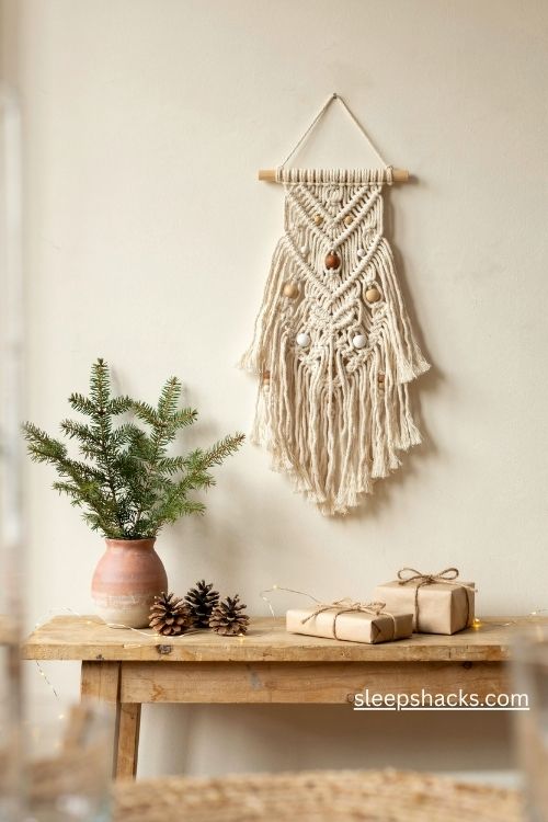 Beaded macrame christmas tree wall hanging with natural wooden beads and soft cotton fringe
