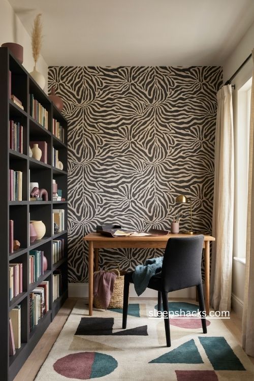 Bold zebra print home office with graphic rug black bookcase and walnut desk