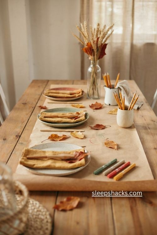 Budget friendly Thanksgiving kids table ideas with paper and leaves
