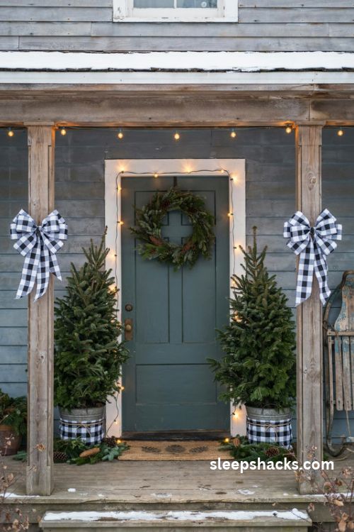 Buffalo check christmas front porch with plaid bows and potted evergreens