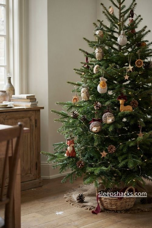 Ceramic woodland animal christmas ornaments with foxes deer owls and hedgehogs