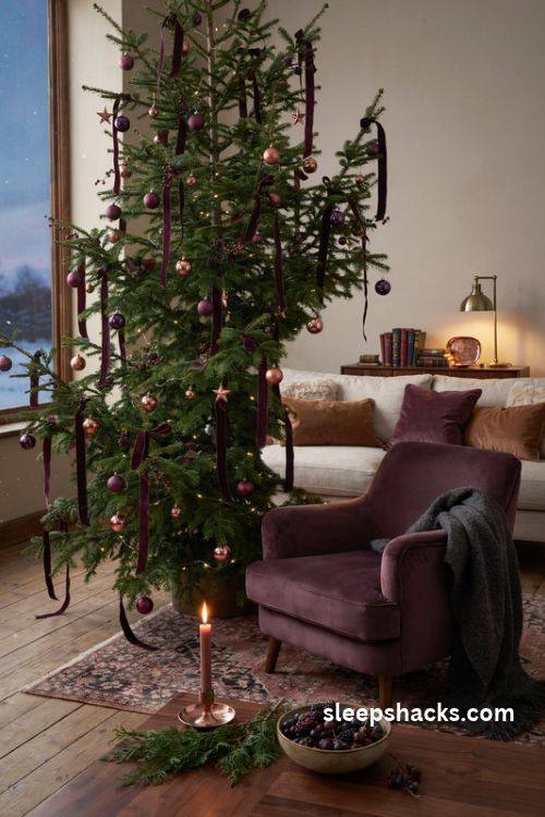 Copper and deep plum christmas tree with velvet ribbon and jewel toned ornaments