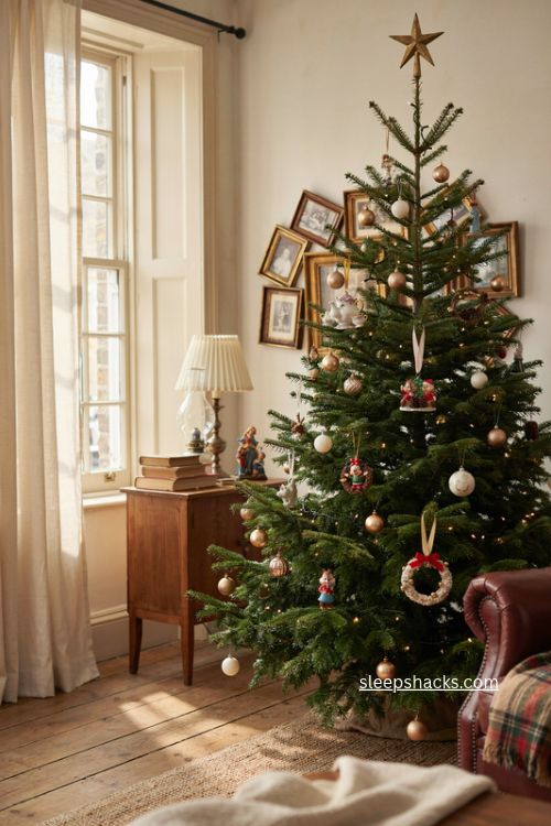 Disney keepsake collectors Christmas tree with porcelain ornaments gold ribbons and vintage holiday decor 