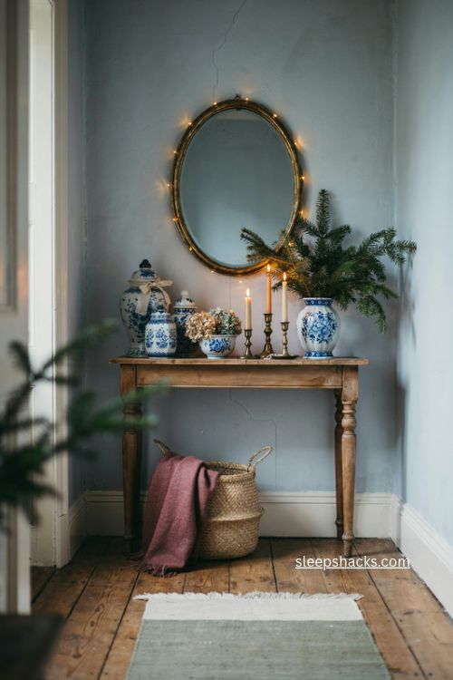 English country christmas blue and white ceramics with fresh greenery and dried hydrangeas