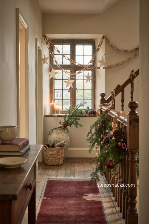 English country christmas paper chains cinnamon pinecones and handmade decorations 