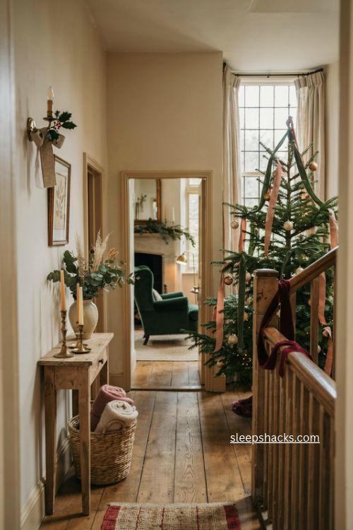 English country christmas velvet ribbon on bannister and traditional tree 