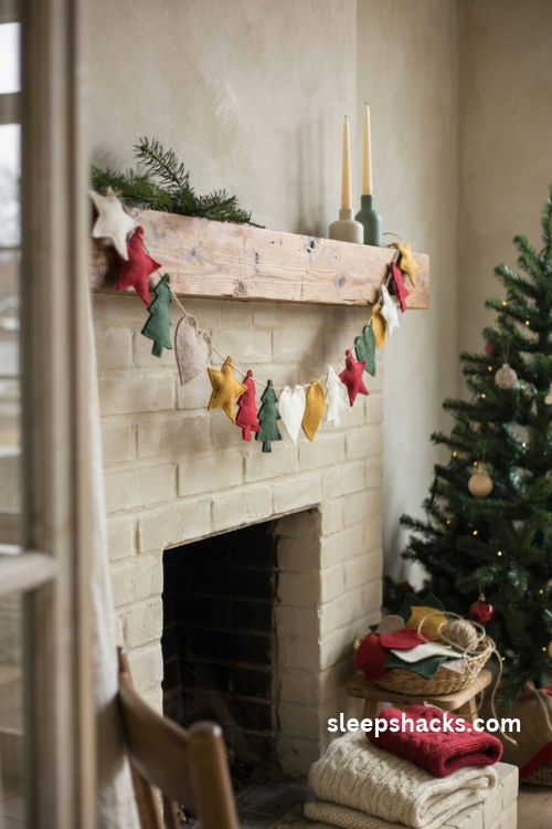 Felt Christmas garland ideas with colorful handmade felt shapes decorating a cozy rustic fireplace mantel