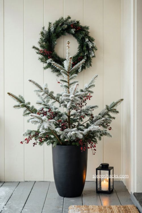 Flocked white pine christmas planter with dark red berries