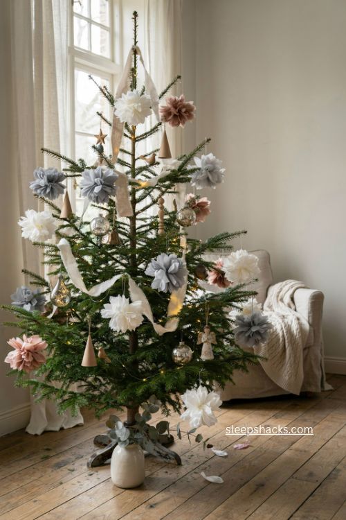 French country Christmas tree with paper pompoms and heirloom ornaments